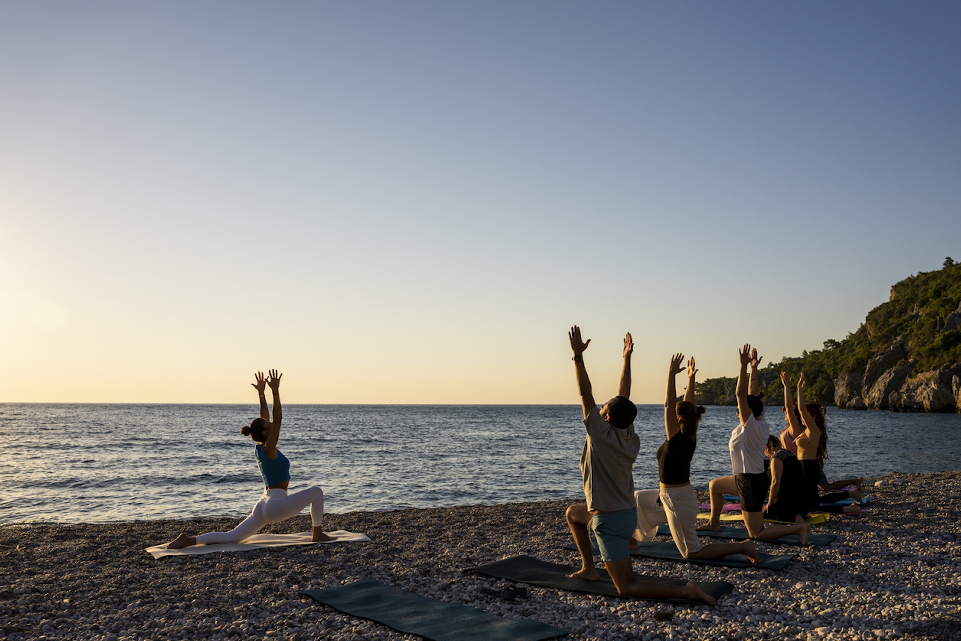 Sunset yoga on the beach — movement, breath, and the Ionian Sea